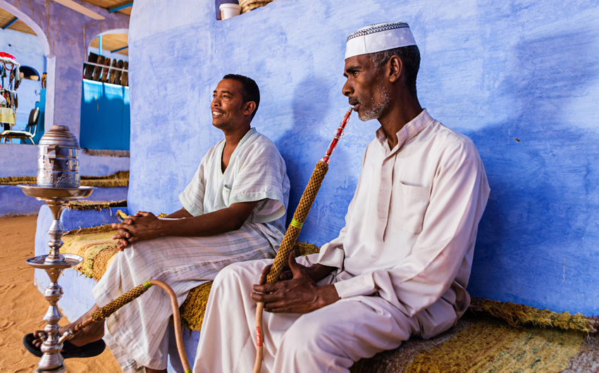 Nubian men smoking waterpipe