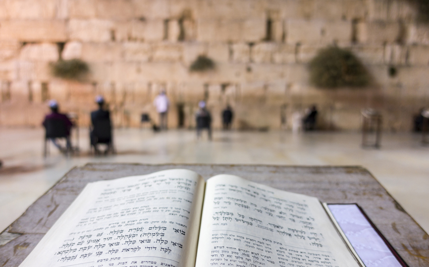 Prayer book in front of Western Wall, Jerusalem
