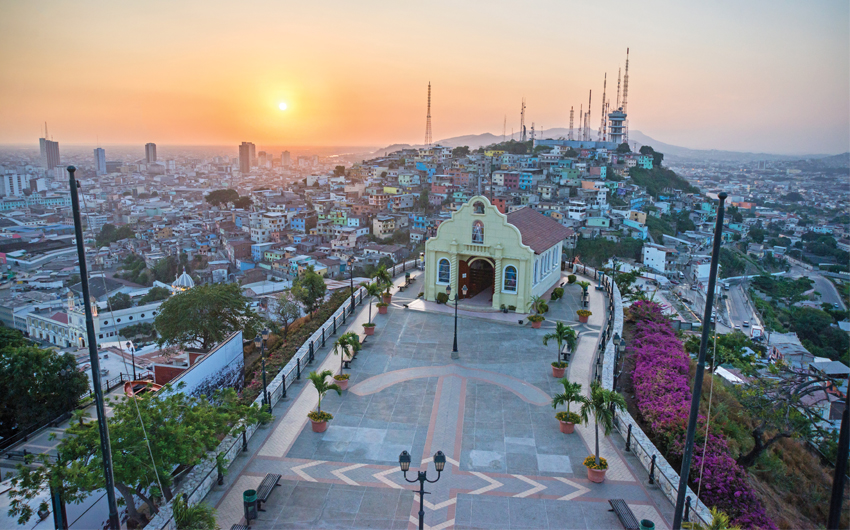 High view of a small chapel and the city of Guayaquil